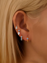Load image into Gallery viewer, Ayla Triple Solitaire Moonstone Gold Huggies | Gold Plated 925 Sterling Silver
